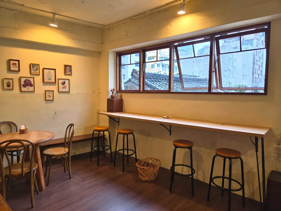 Inside the basement space at Sarugak20, lit by natural light