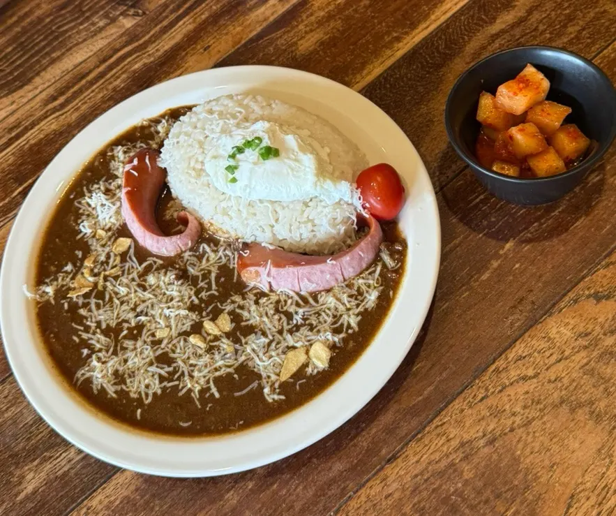 Special Curry with a soft egg, sausage, and cheese