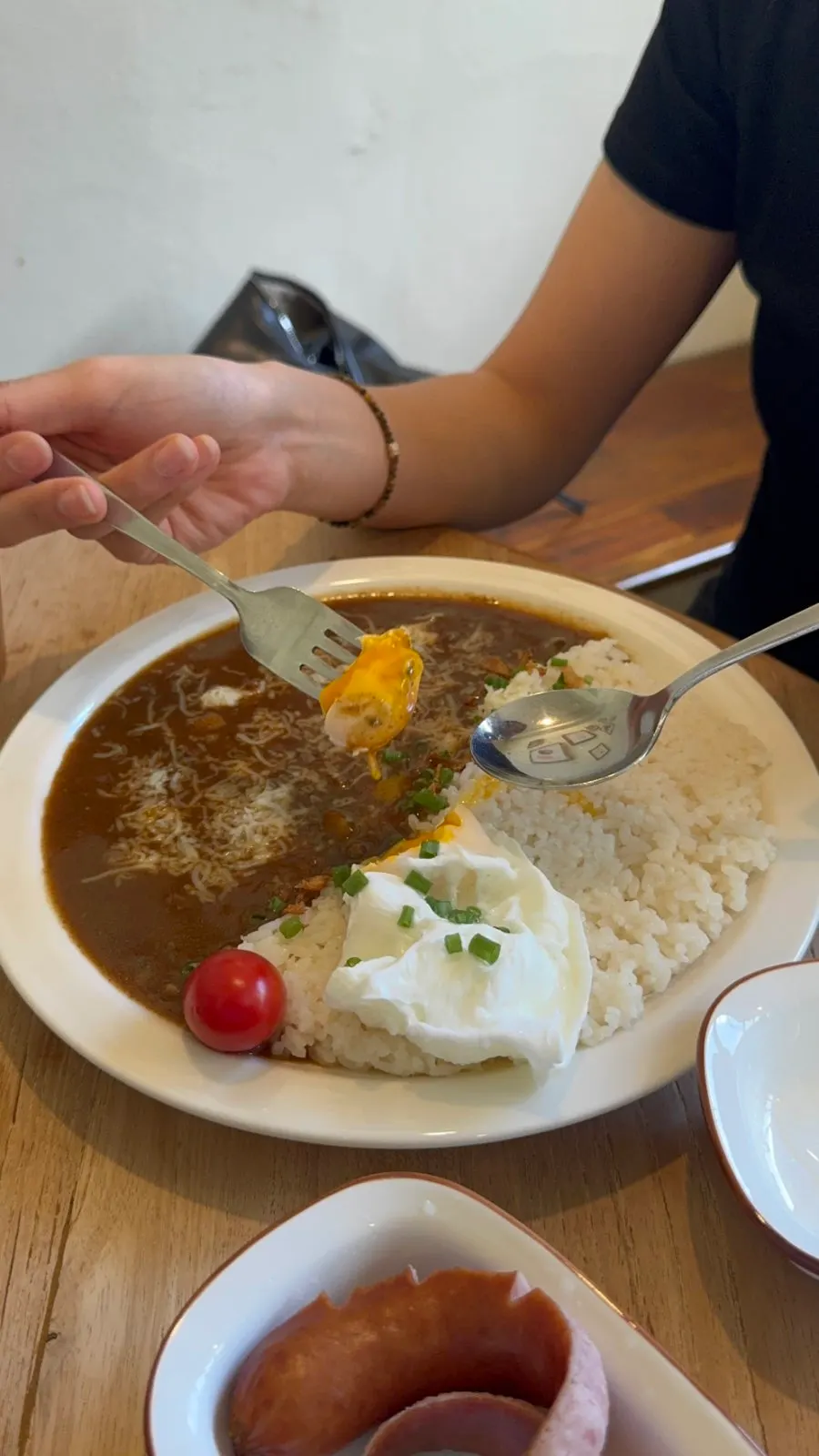 Beef curry with a poached egg