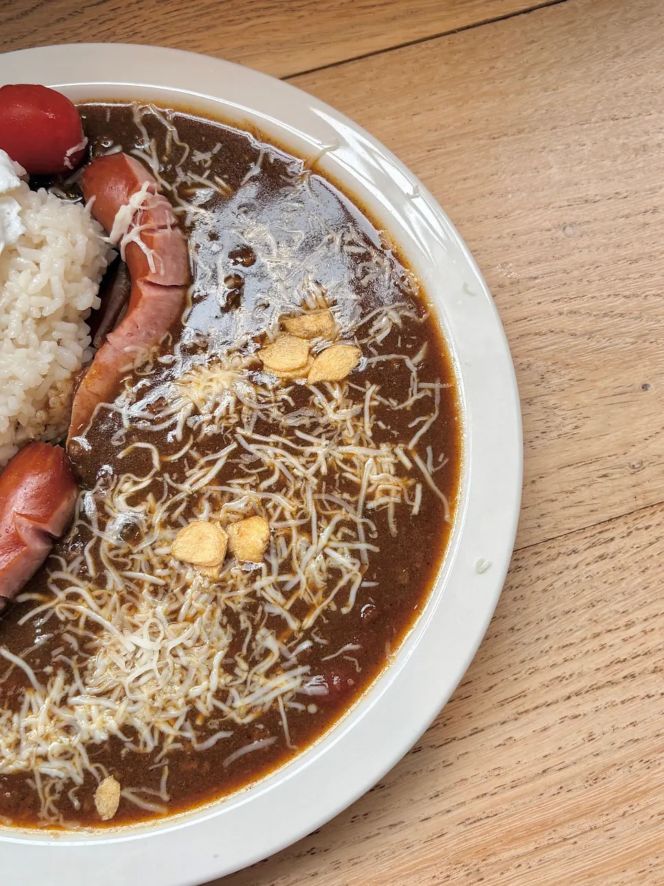 Special Curry topped with poached egg and cheese
