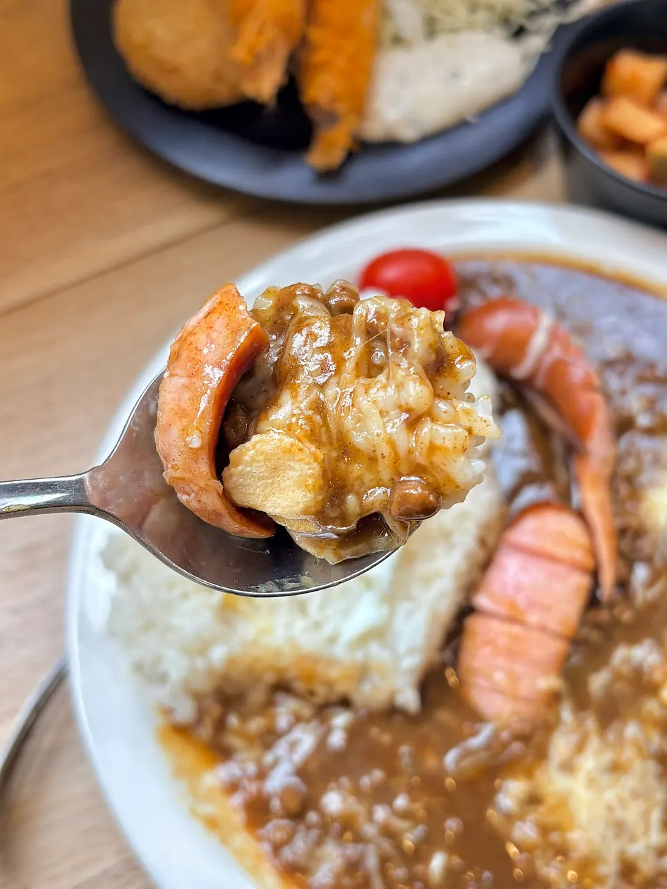 Special Curry topped with sausage and poached egg