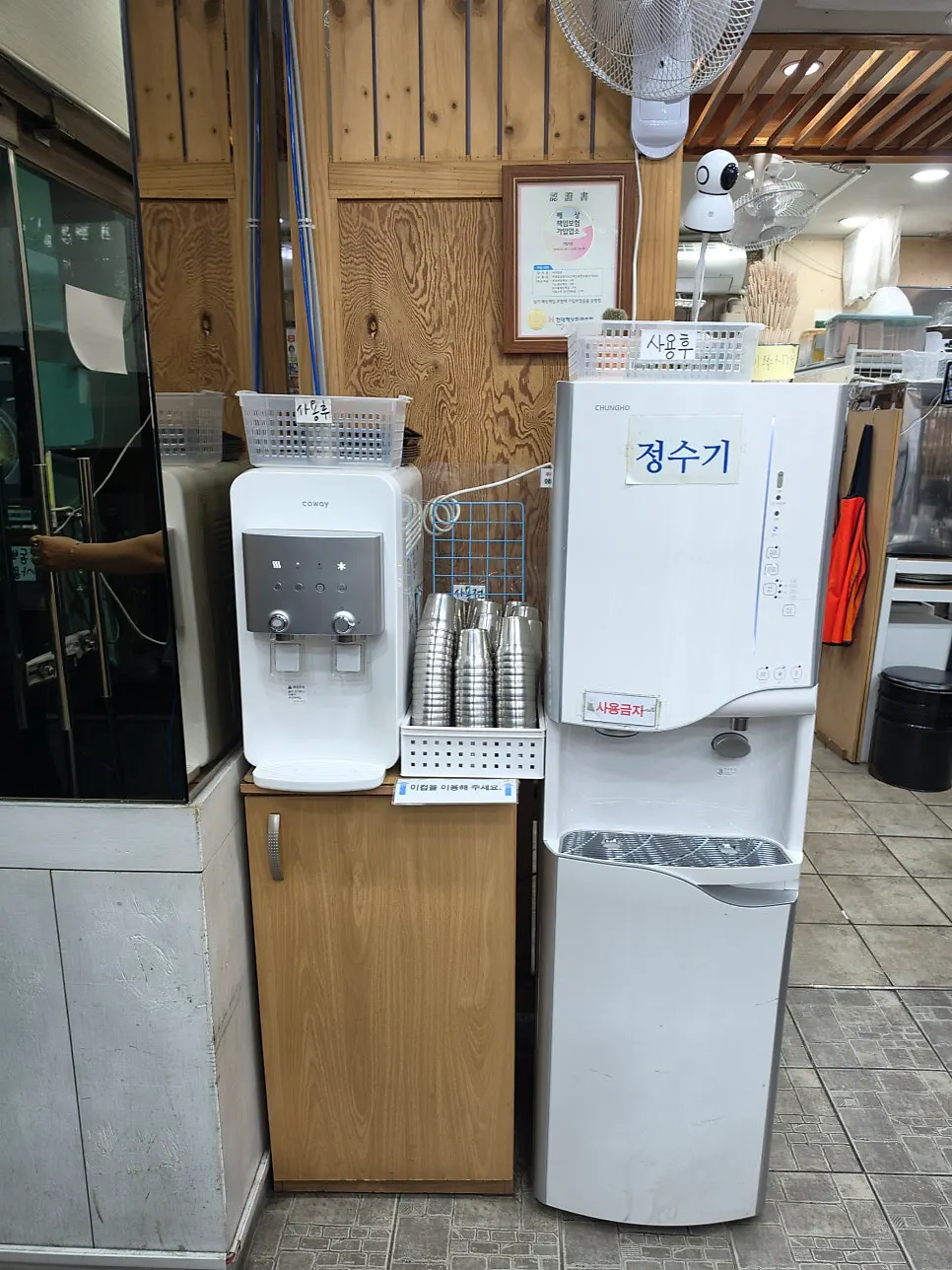 Utensils and a self-service corner at a table in Seomyeon Milmyeon