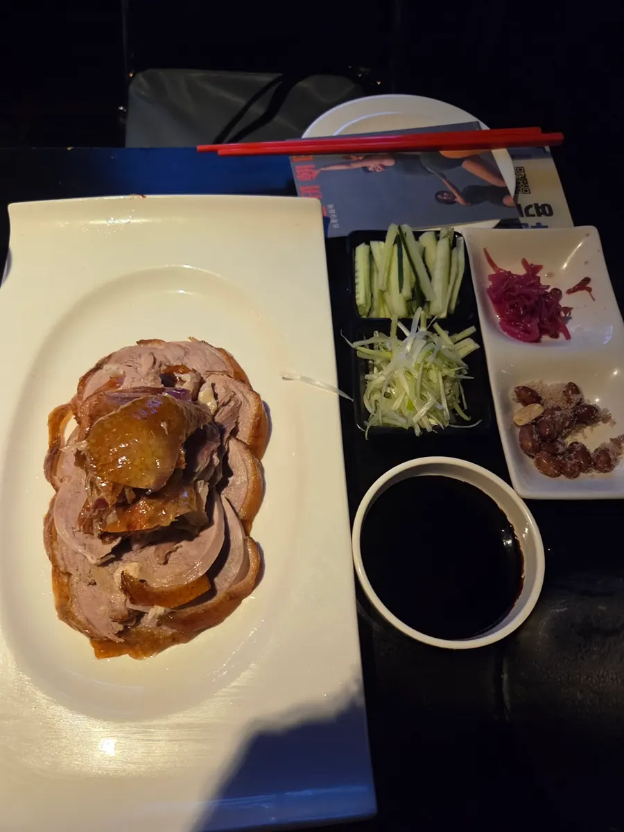 Half a Peking duck sliced into easy-to-eat pieces