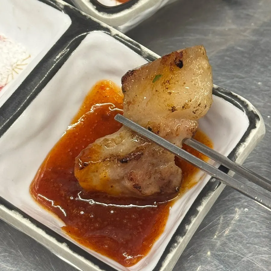 Shishito peppers and mushrooms grilled as garnish