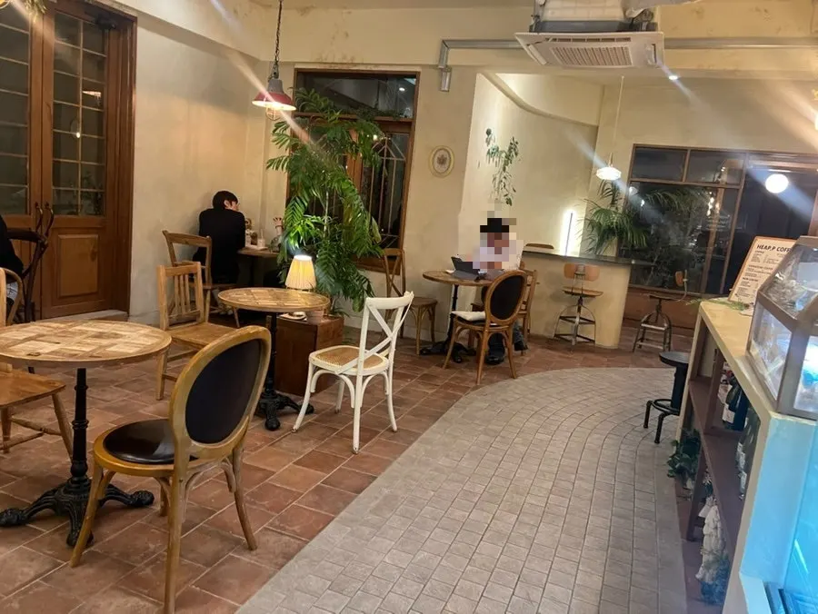 Interior with solid-wood tables and decorative objects