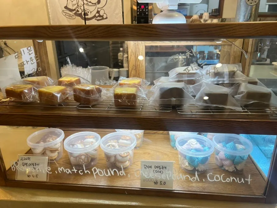Dessert display case with cream pies and cream puddings