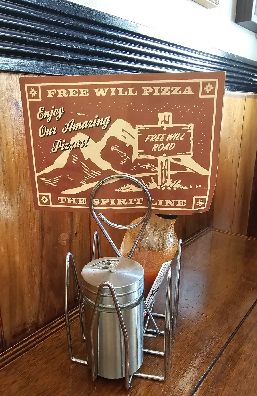 Vertical shot of the Freewill Pizza entrance