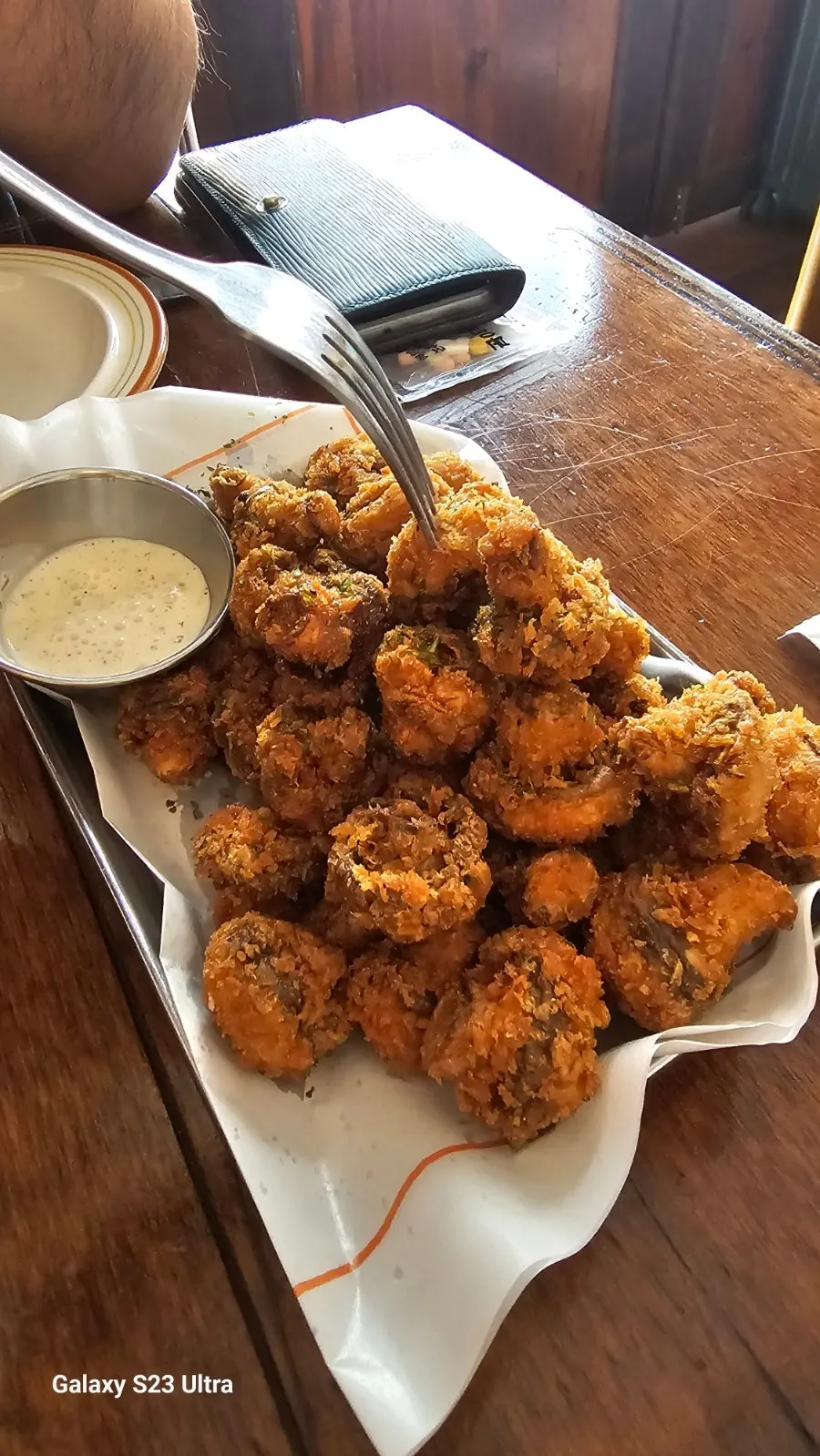 Table setting with fried mushrooms and drinks included in the set