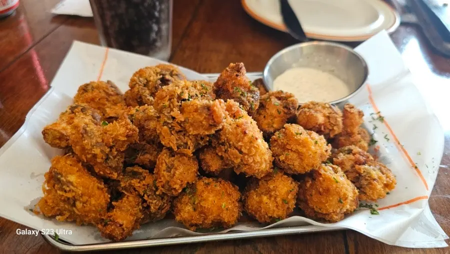 A plate of freshly fried mushrooms