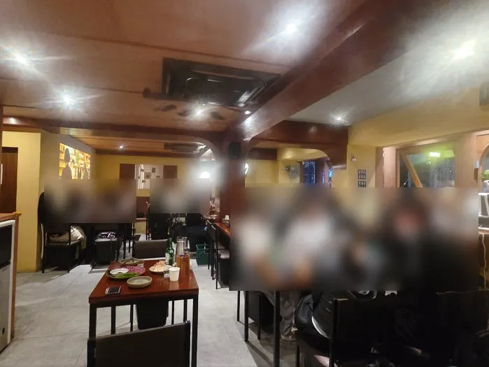 Interior of Ganbame with open kitchen visible
