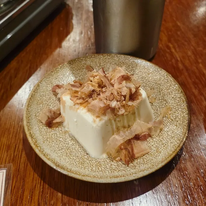 Basic side dish of tofu topped with bonito flakes