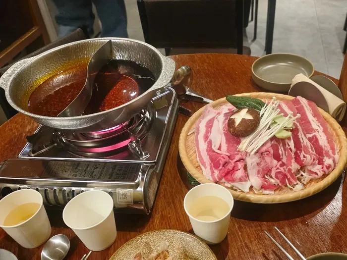 Half-and-half hotpot in a pot divided down the middle