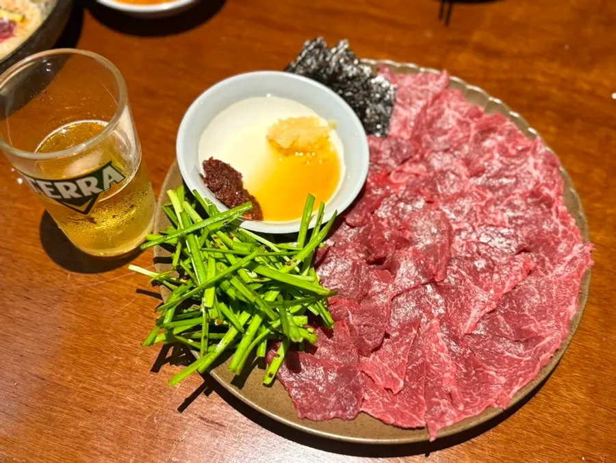 A full plate of glossy, deep-red mungtigi