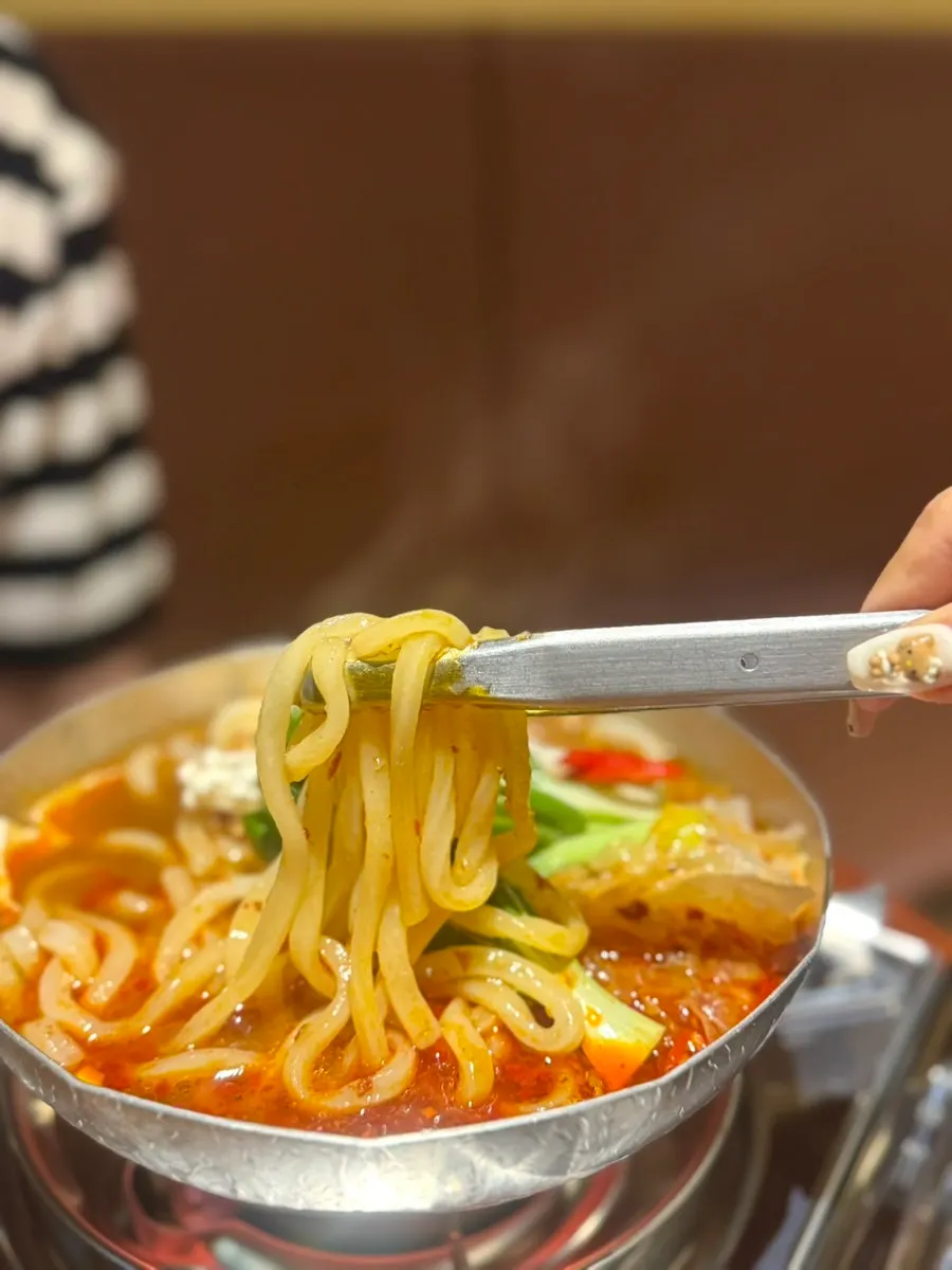 Side dish mala udon on the table