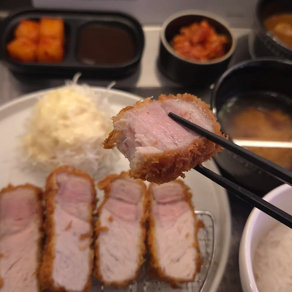 Cross-section of the thick Jeju black pork sang loin katsu
