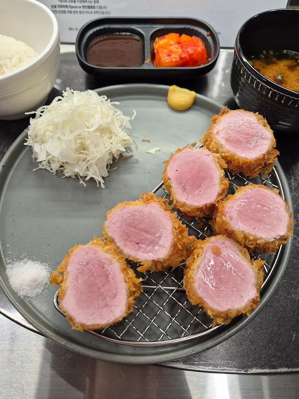 Sliced YBD hire katsu on a plate