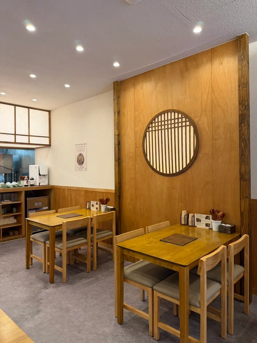 Tidy interior of Hyangtaek Jeonpo Branch Korean restaurant