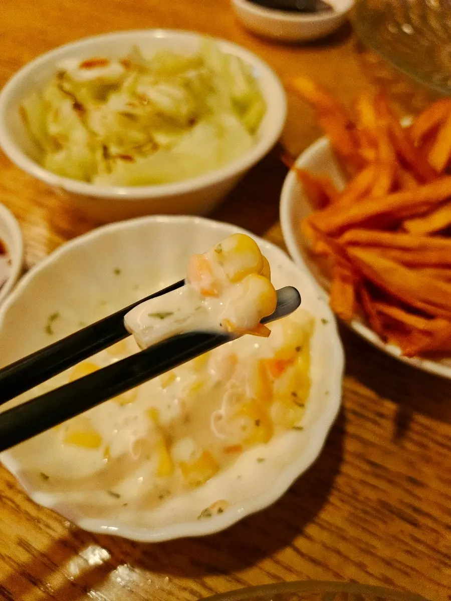 Starter snacks: corn salad, cabbage salad, sweet potato stick crackers