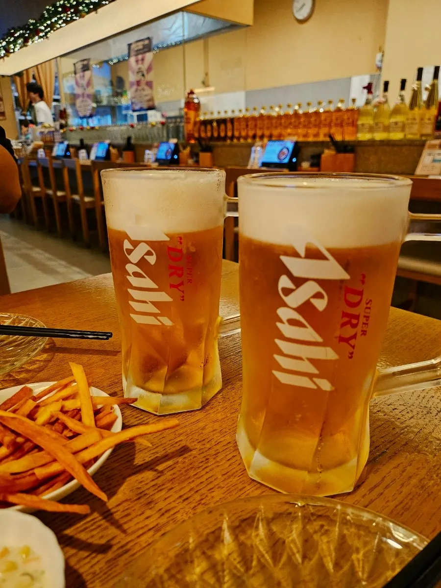 Izakaya table with fried snacks laid out