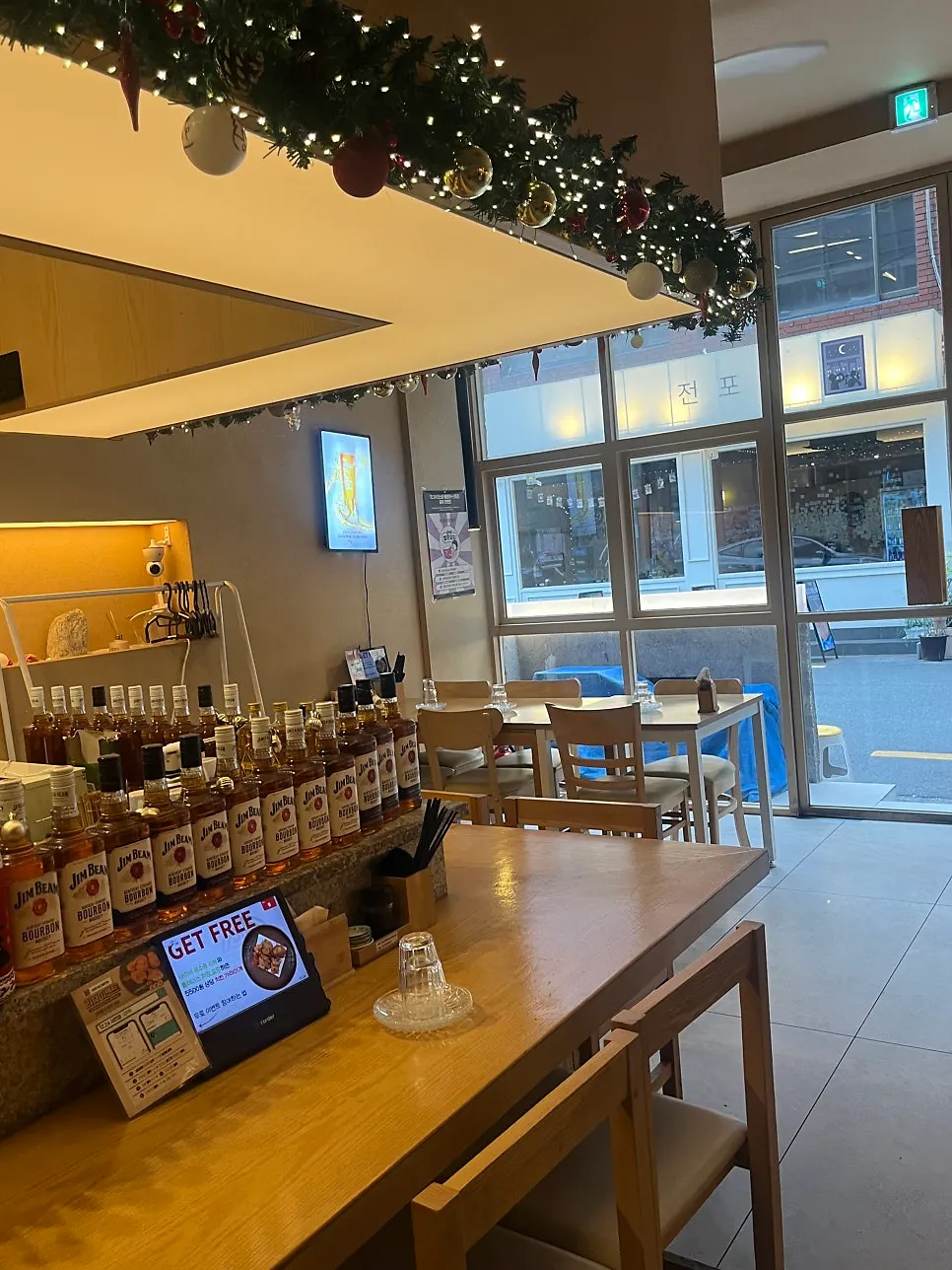 Bar seats and tables for four at 12.24 Seomyeon Branch