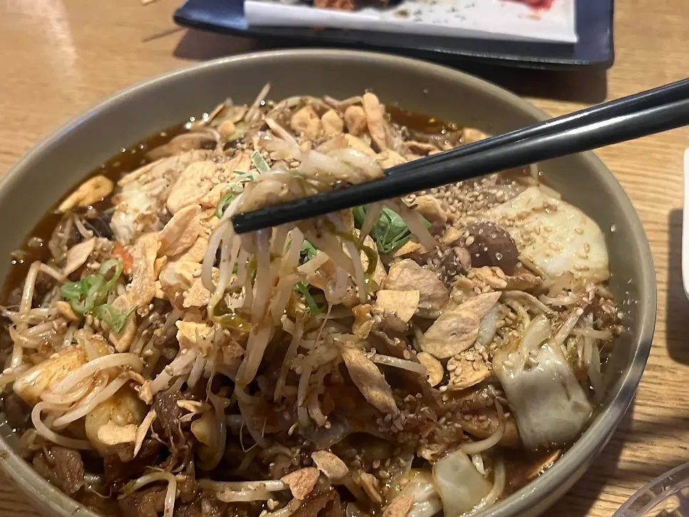 Generously loaded beef brisket and mung bean sprout stir-fry