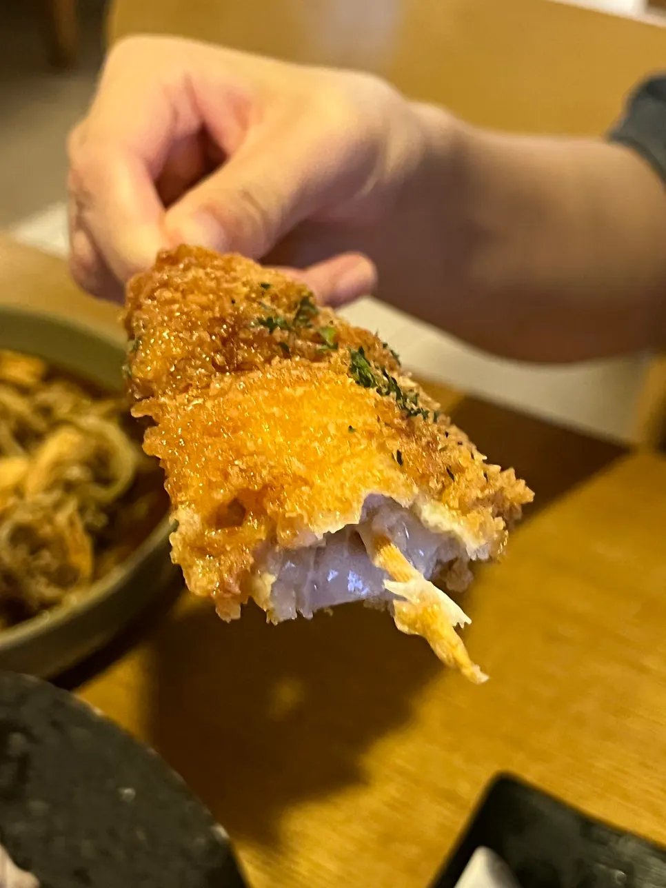Juicy interior of the fried chicken thigh
