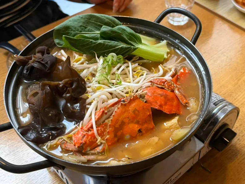 A generously filled crab odeng-tang