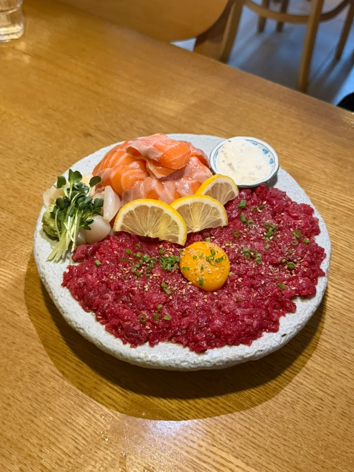 A spread of sashimi and drinks at 12.24 Seomyeon Branch