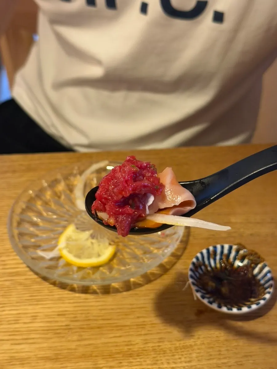 Beef tartare, salmon and onion combined together
