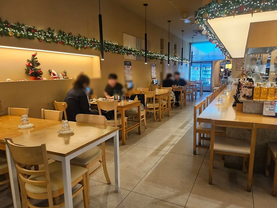 Interior of 12.24 Seomyeon Branch with calm lighting