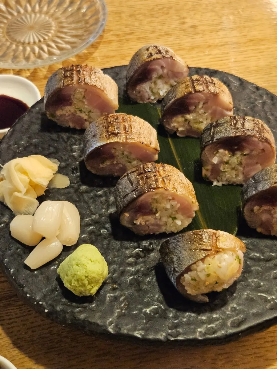 Yukhoe plate served with radish sprouts and pickled ginger