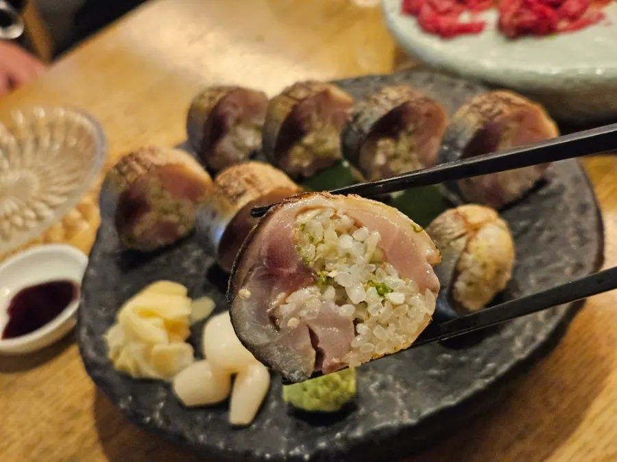 Mackerel bong-sushi served with wasabi and vinegared ginger