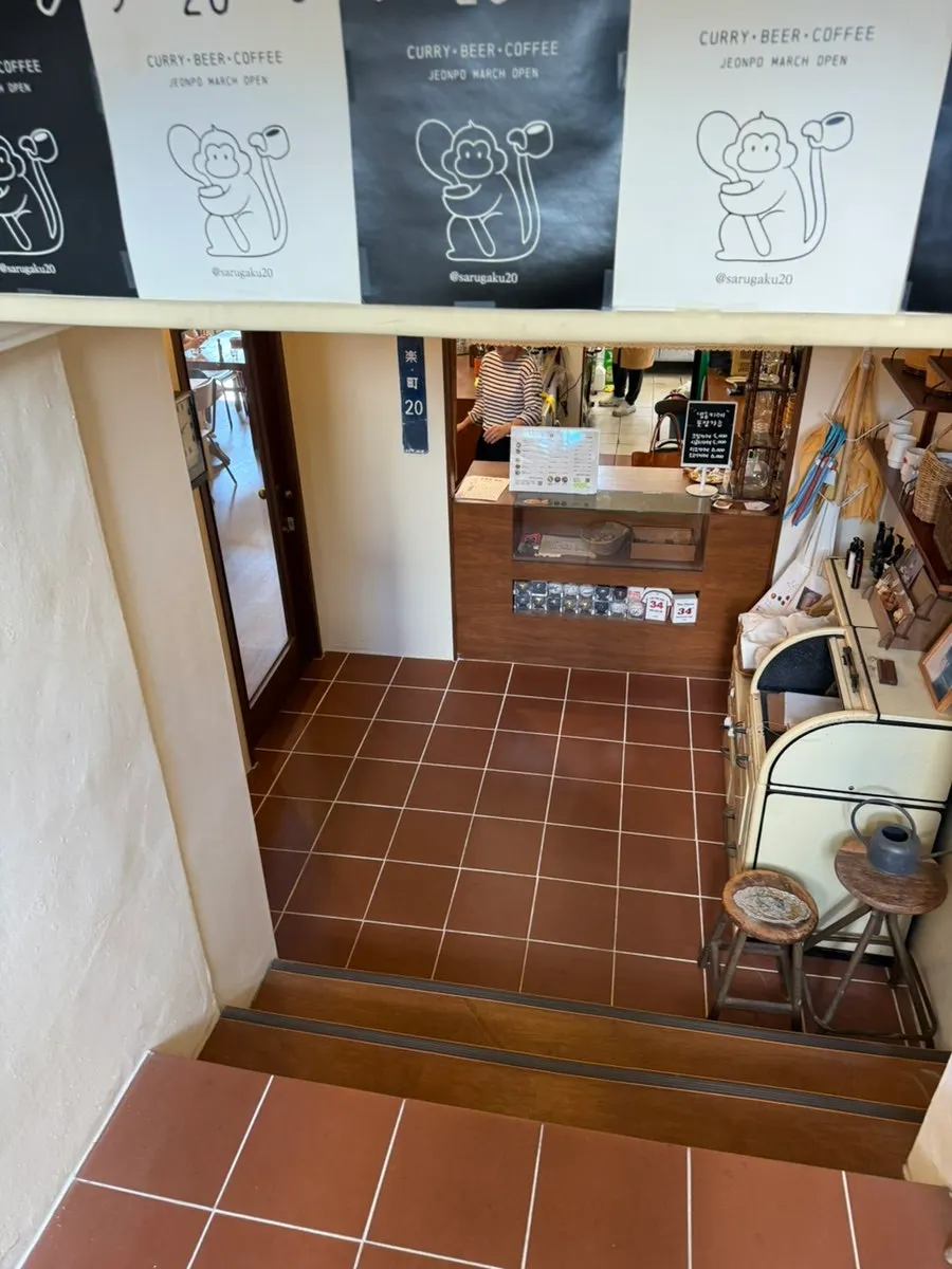 Store entrance on the left in the basement