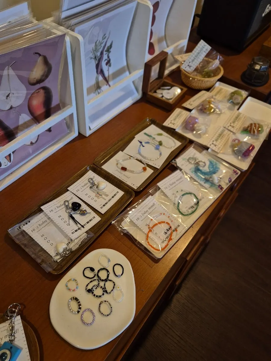 Keyrings and other accessories displayed for sale at Sarugak20