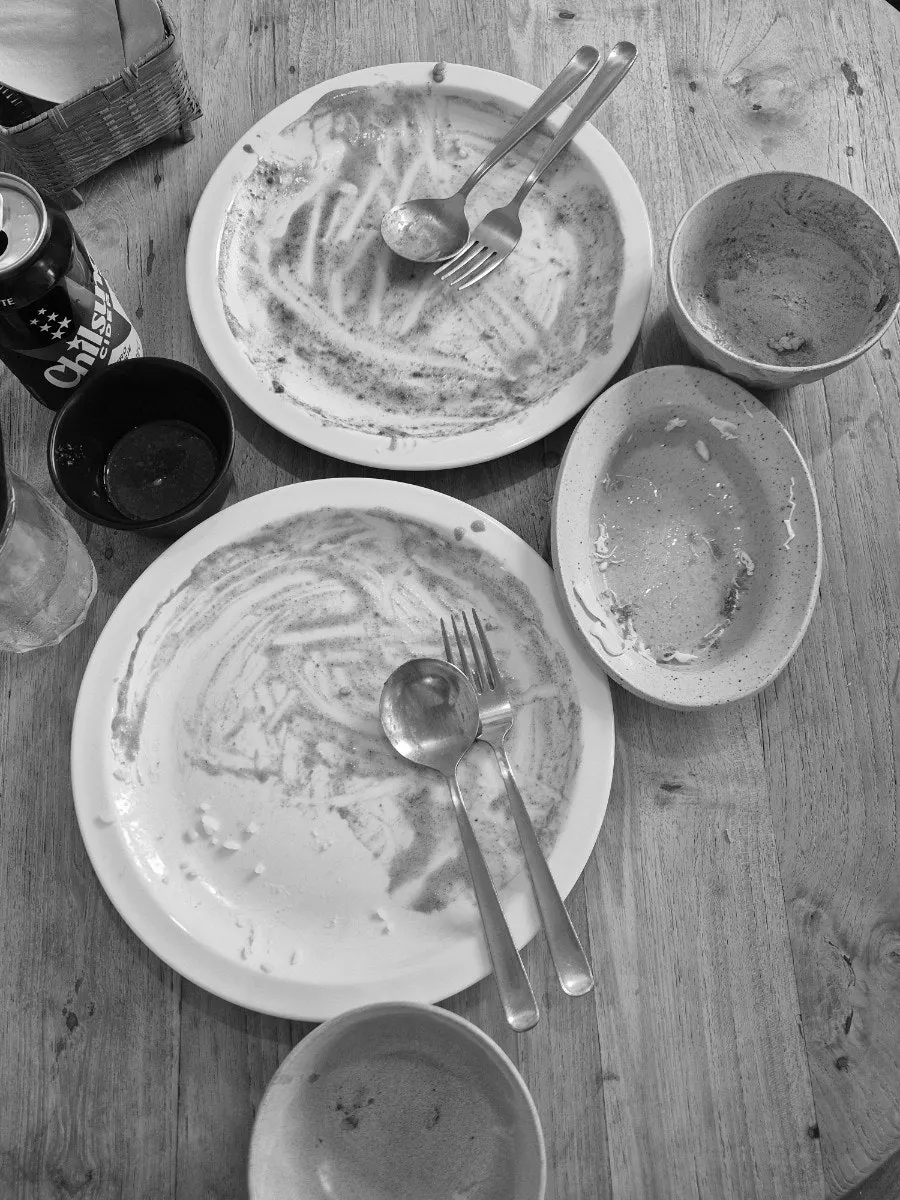An empty curry plate scraped completely clean
