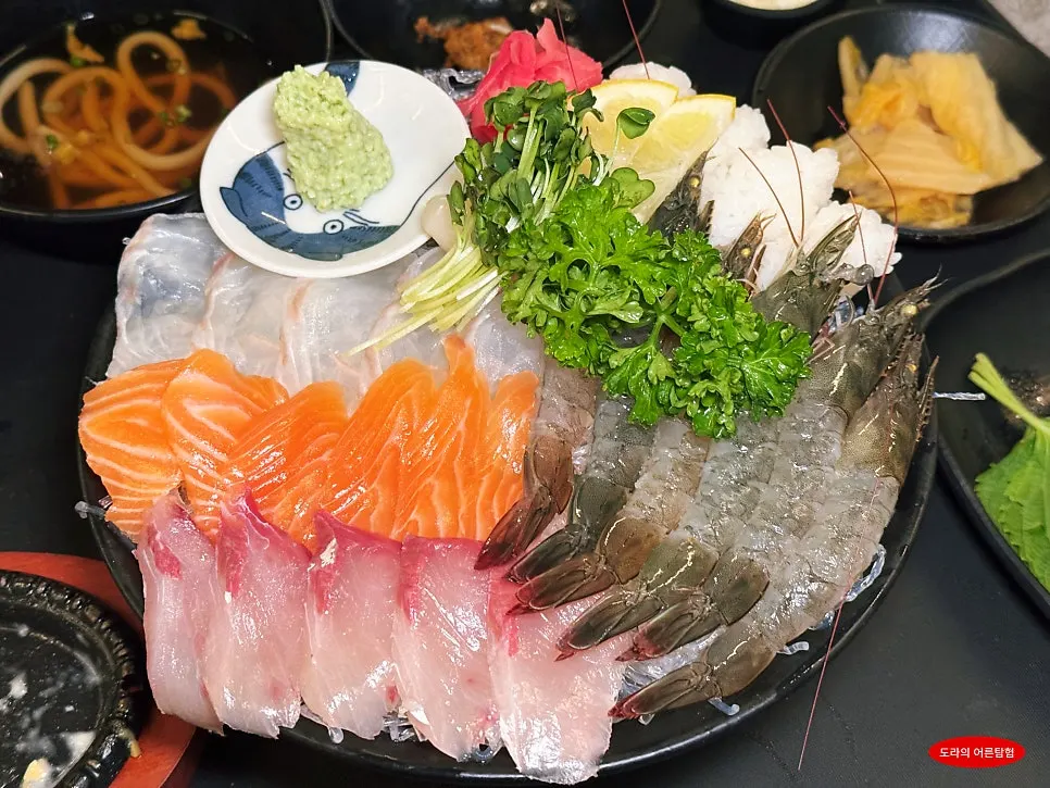 Rigo Susan's assorted sashimi and live raw shrimp platter