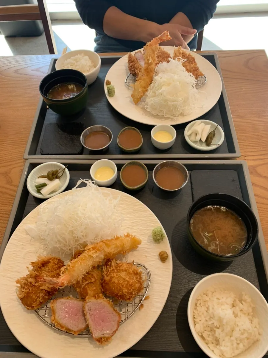 Loin and fillet tonkatsu sets with fried shrimp on the table