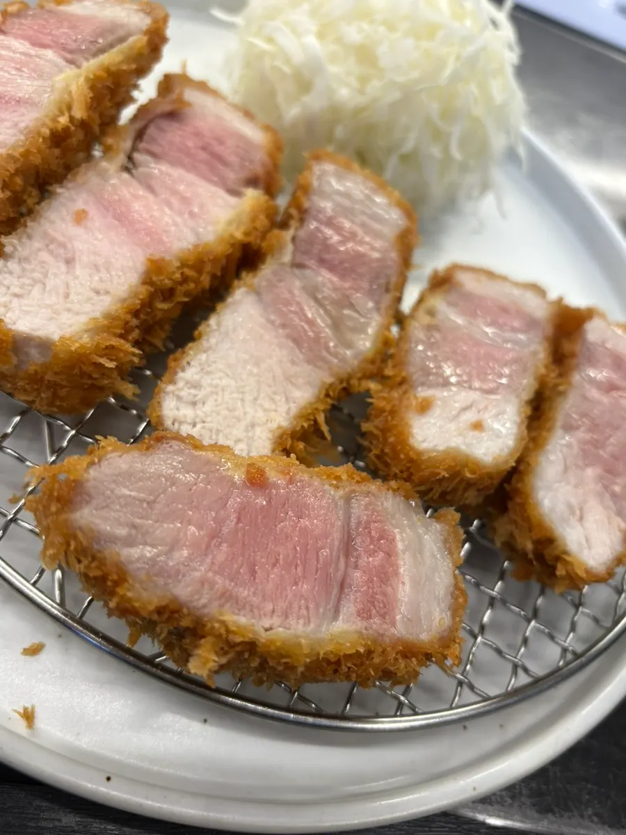 Katsu cross-section showing juices and tender grain