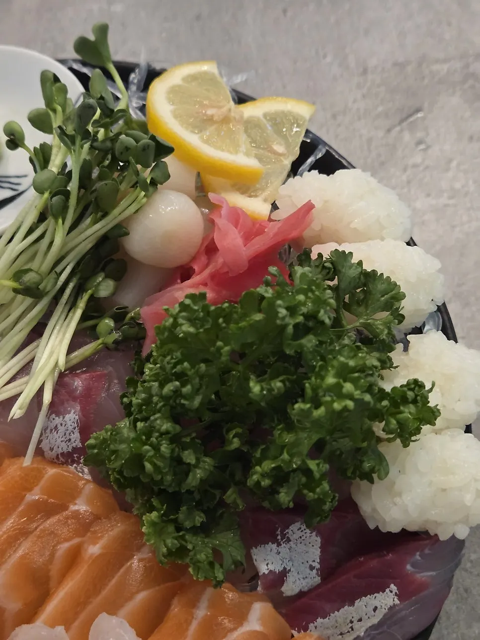 Salmon sashimi included in the mixed set