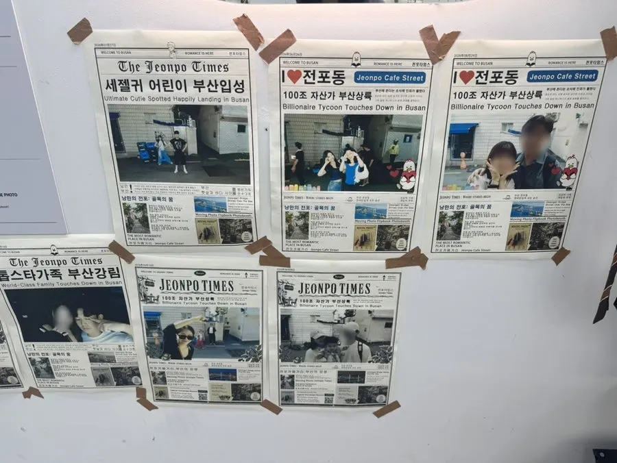 Newspaper-concept photos with various headlines pinned on the wall