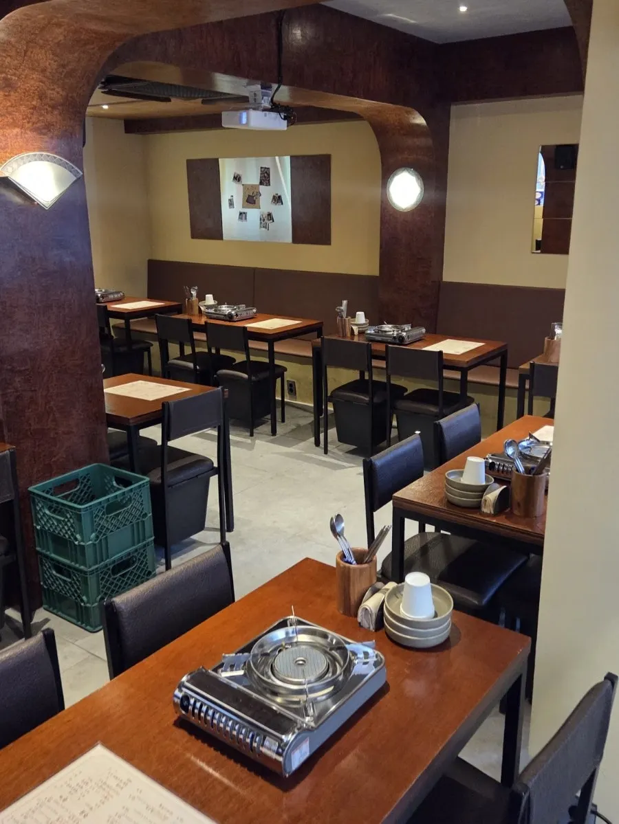 Wood-finished exterior of Ganbame