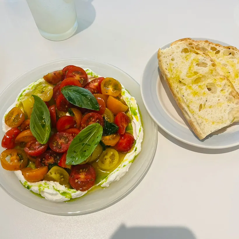 Ricotta caprese with colorful tomatoes and ricotta cheese