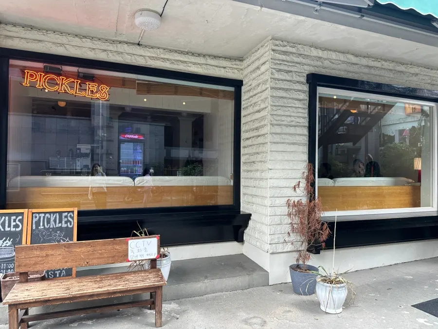 Entrance to Pickles on the ground floor of the Upper East Bakery building