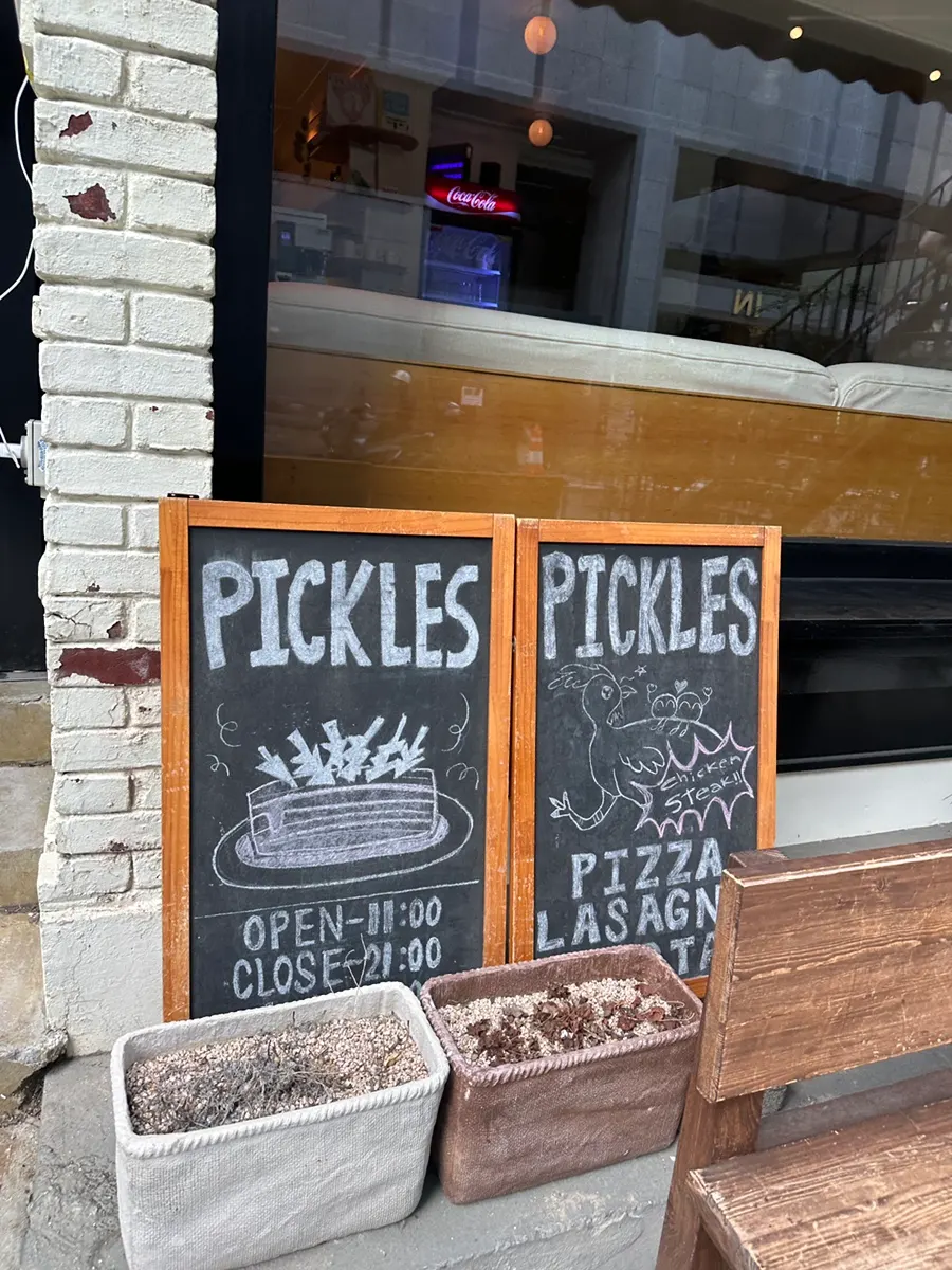 Pickles business hours sign