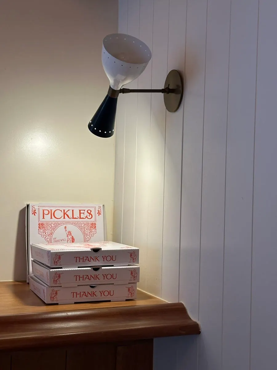 Pickles interior with white wood walls