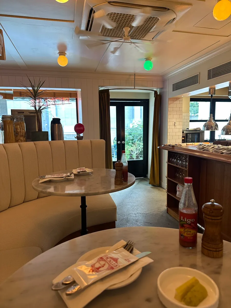 Sofa-style bar seats facing the open kitchen