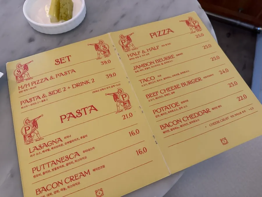 Pickles menu board showing pizza and pasta sets