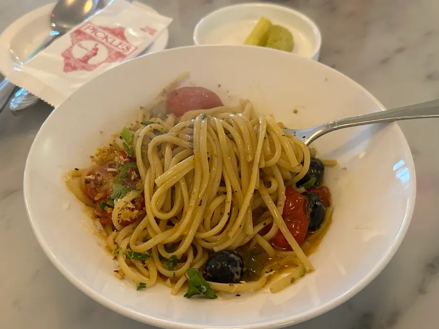 Steaming puttanesca pasta