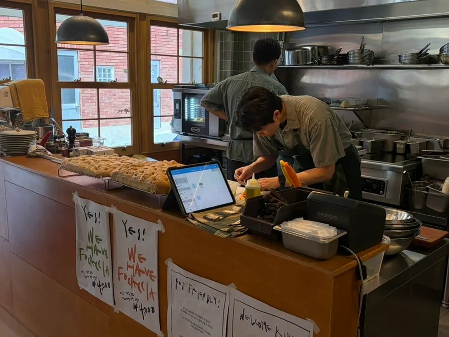 Menu story about daily bread and house-made sauces