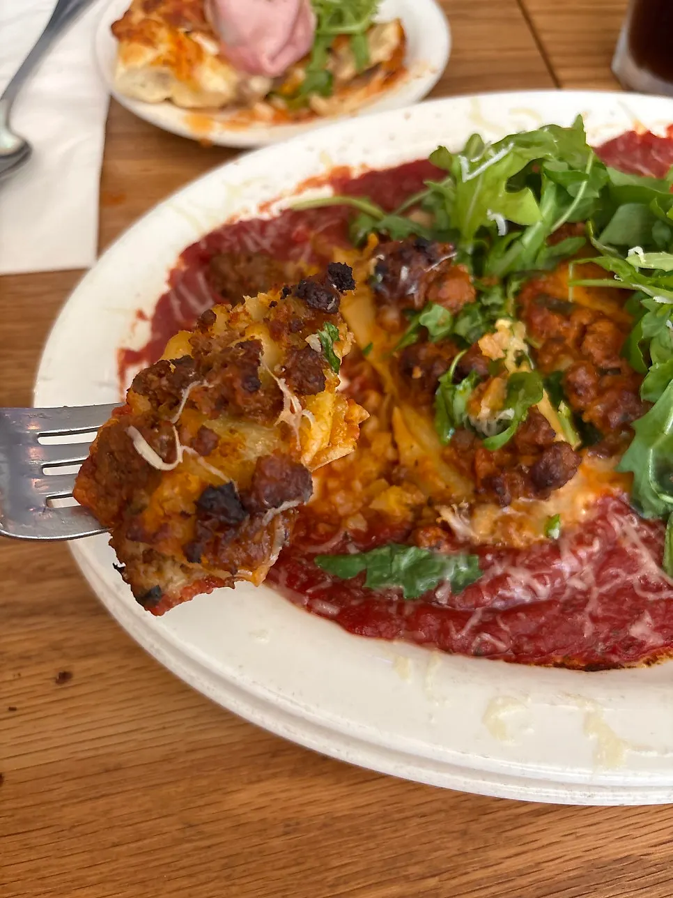 Slice of beef cheeseburger pizza